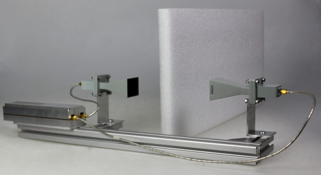 Contactless inline moisture measurement of thicker materials